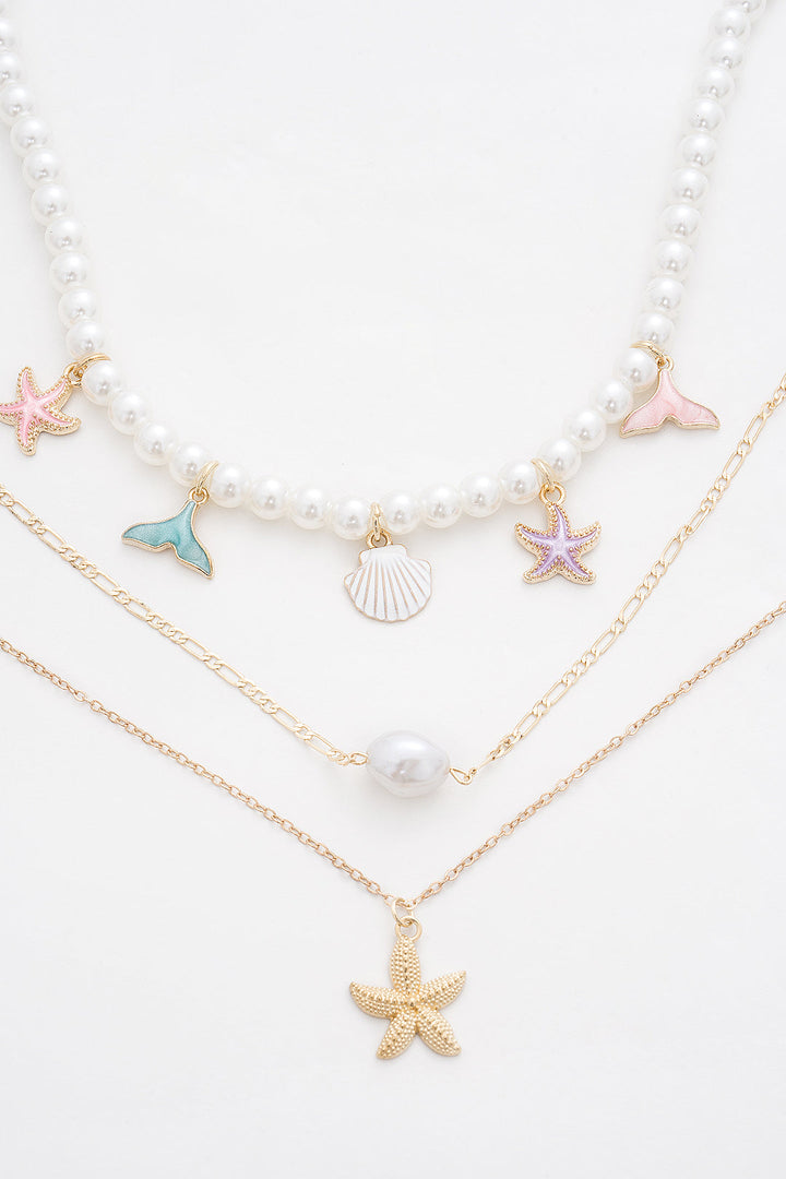 Conjunto de Colar com Pendente em Camadas de Estrela do Mar e Conchas