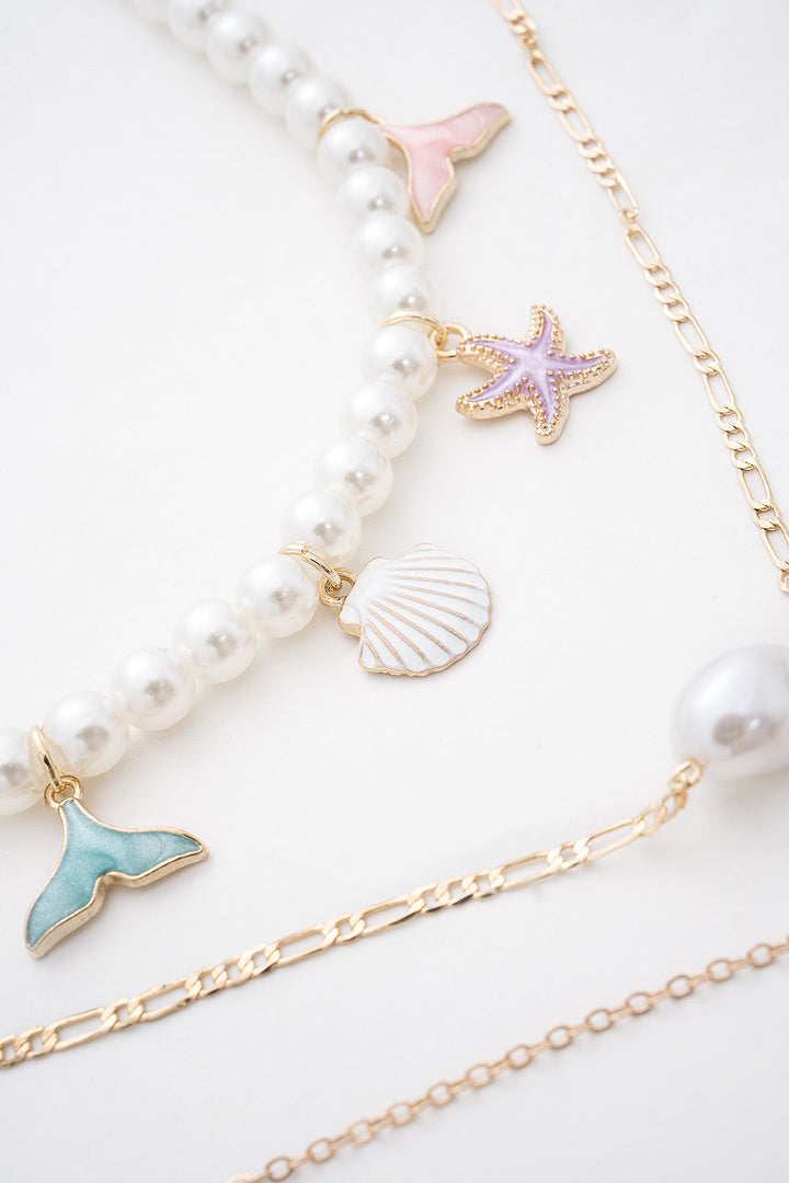 Conjunto de Colar com Pendente em Camadas de Estrela do Mar e Conchas